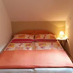 & Vendégház